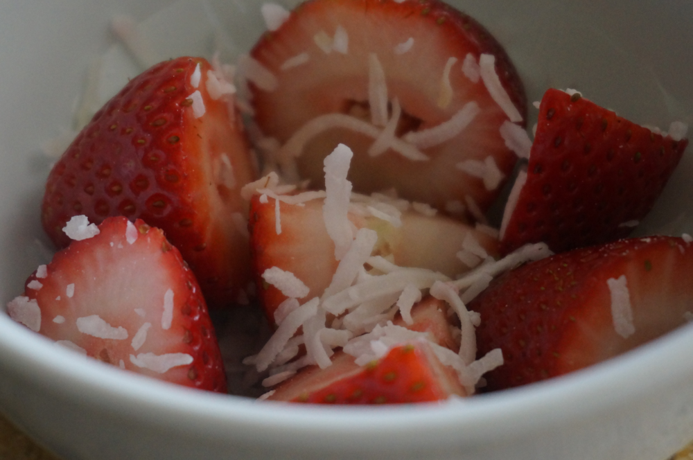 Cut up Strawberries with shredded coconut:&nbsp;  Surprisingly   &nbsp;satisfying!! &nbsp;